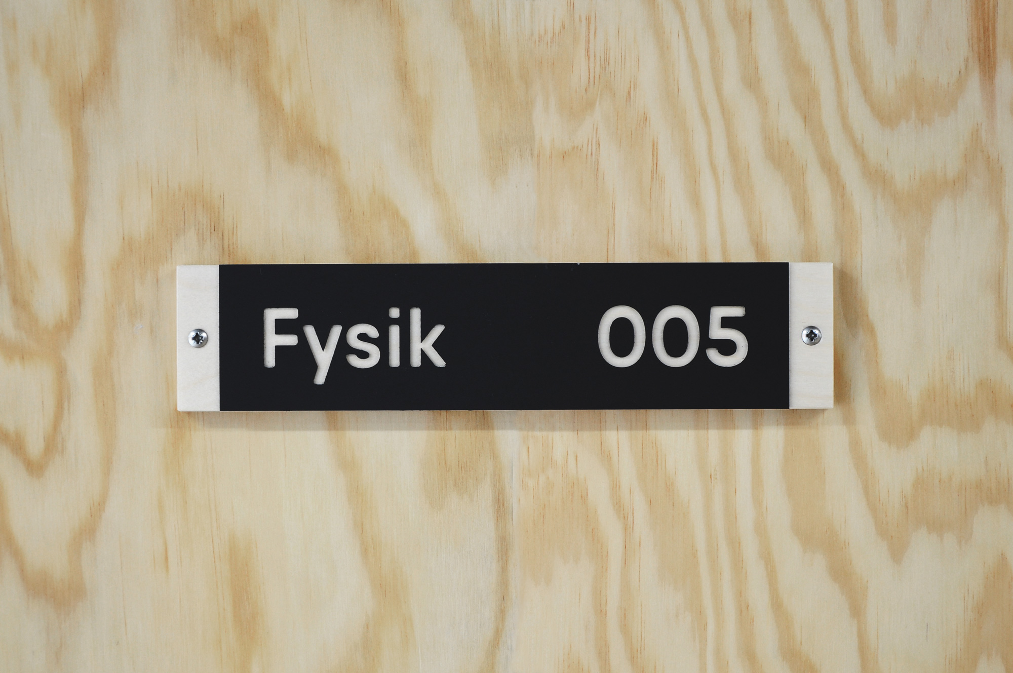 Plywood sign.