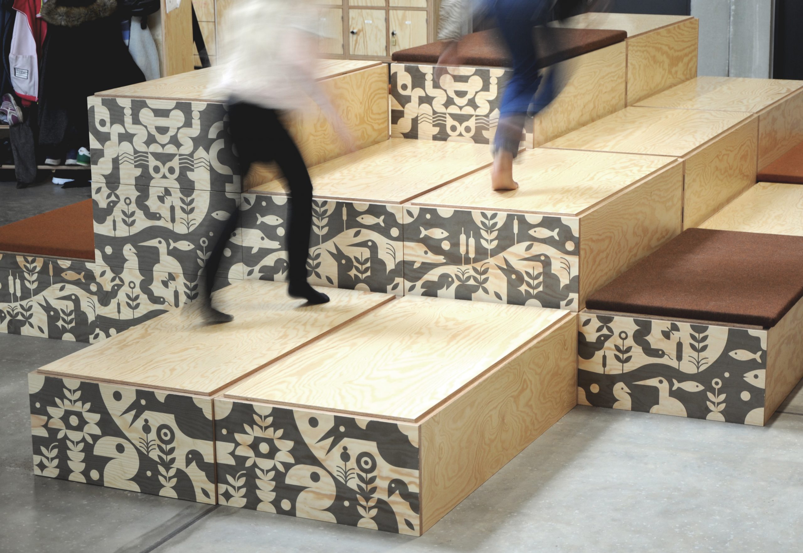 Kids playing on decorated furniture.