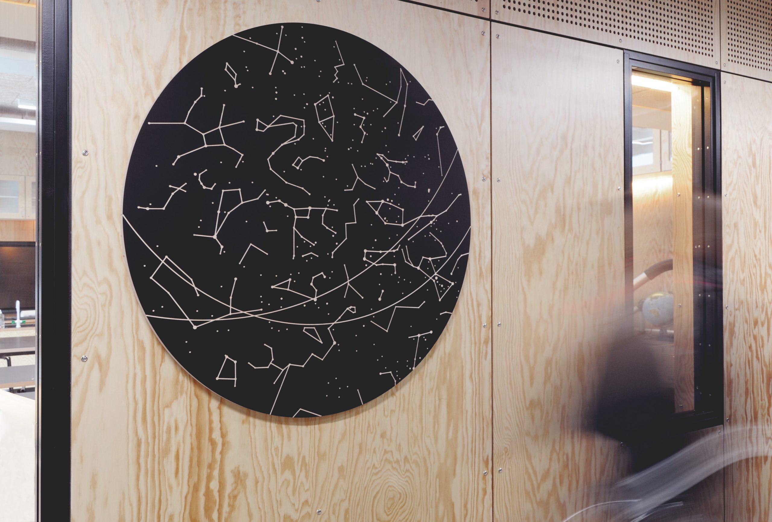 Graphic decoration on plywood wall.